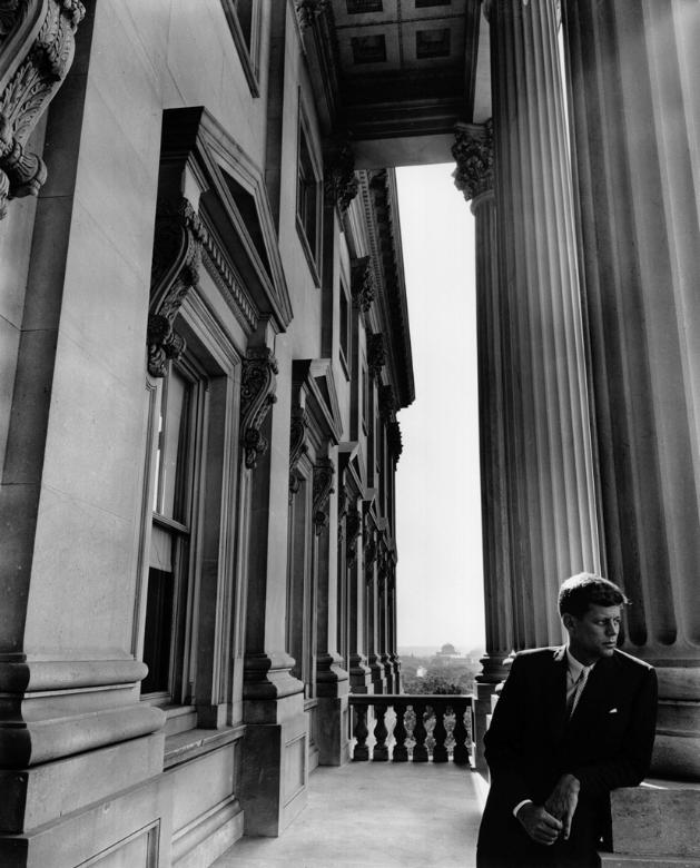 John F. Kennedy standing in a Washington doorway — photograph by Arnold Newman